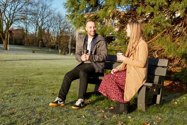 colleagues-having-conversation-on-bench-1366.jpg