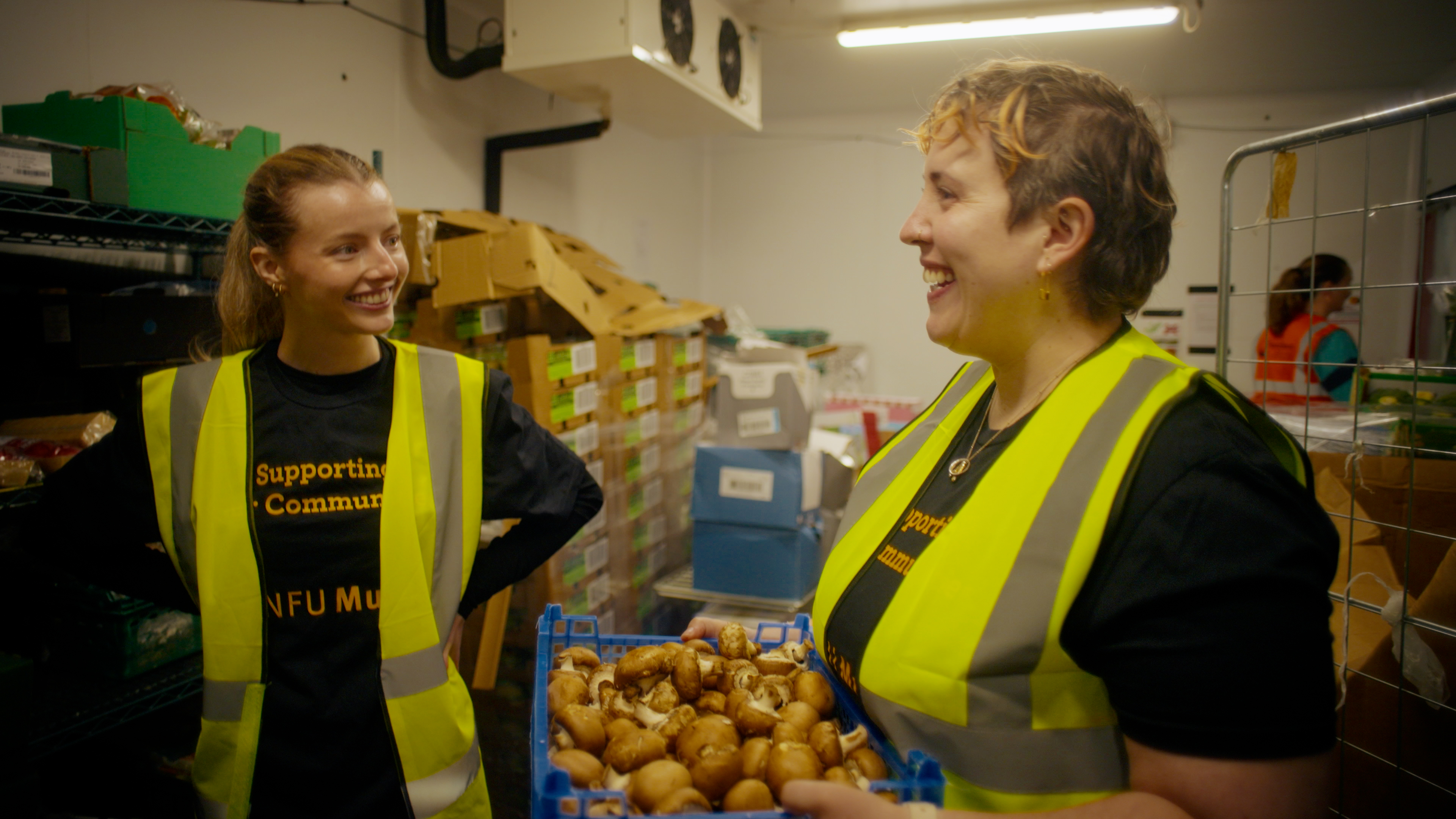Two NFU Mutual employees volunteer for a food redistribution charity